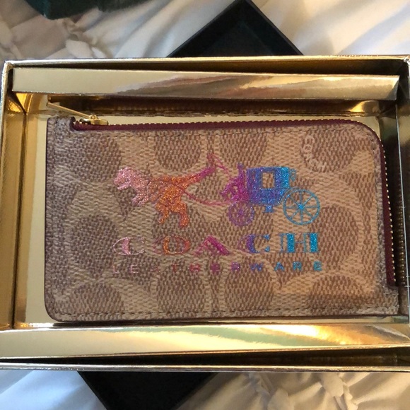 Coach Handbags - NWT Authentic Coach Rexy mini wallet 🦖